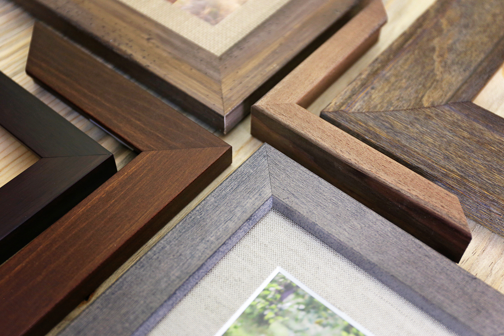 A collection of solid wood photo picture frame corner samples